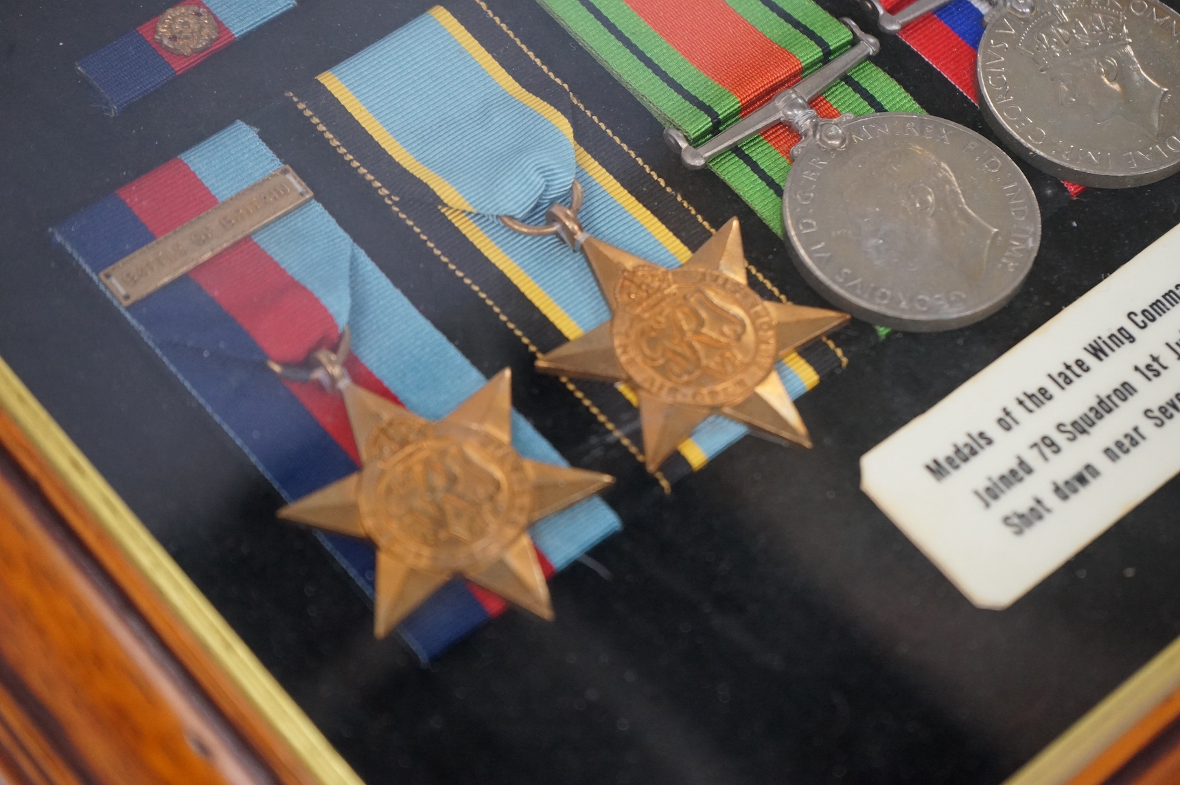 A framed WWII RAF medal group awarded to Wing Commander Brian Robert Noble, comprising;, The 1939-1945 Star, with clasp for the Battle of Britain, The Air Crew Europe Star, The Defence Medal, The British War Medal, The 1